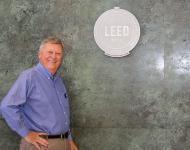Dean Rudy Hasl with LEED Gold Plaque 
